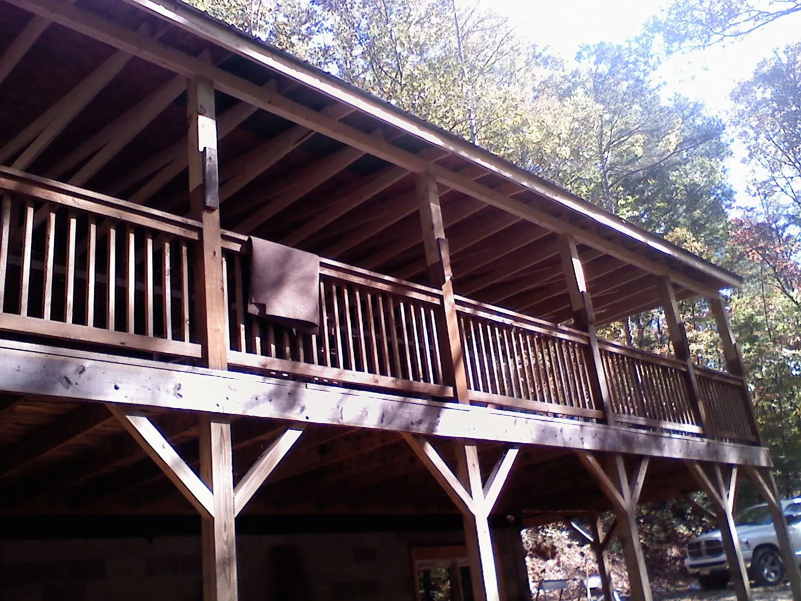 Timber framing under a new elevated porch and deck — Roof Leak Repair in North Dighton by Roofing Brothers
